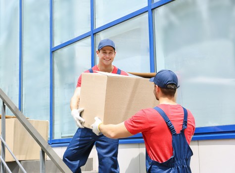 Van loading items in a Notting Hill street for a small move