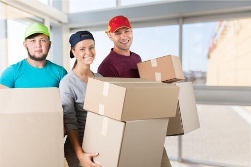 Careful furniture handling in a Notting Hill flat during a local removal