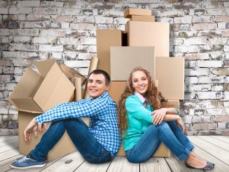 Packing and loading belongings onto a moving truck for a Notting Hill relocation