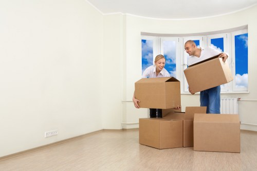 Careful loading and securing of belongings inside a removal van