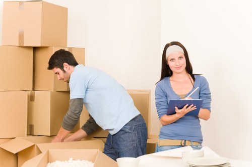 Packed boxes and furniture prepared for student removals in Notting Hill